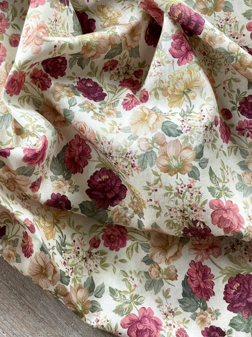 Alessia cotton satin draped in soft folds, showing the fluid drape and quiet lustre of the sateen weave | Atelier 27