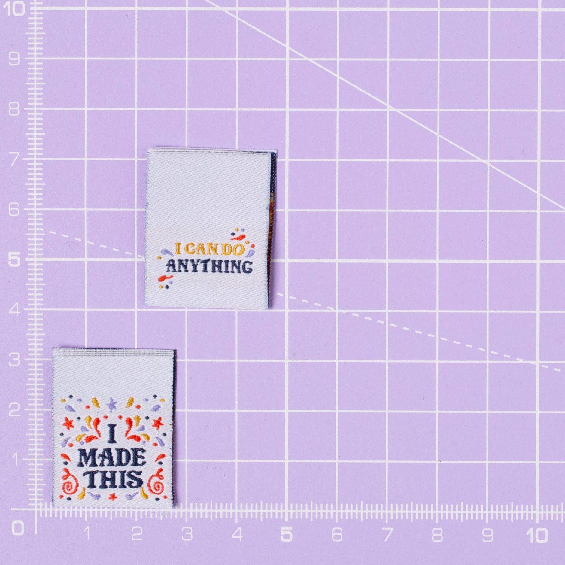 I Made This label shown on cutting mat for size reference
