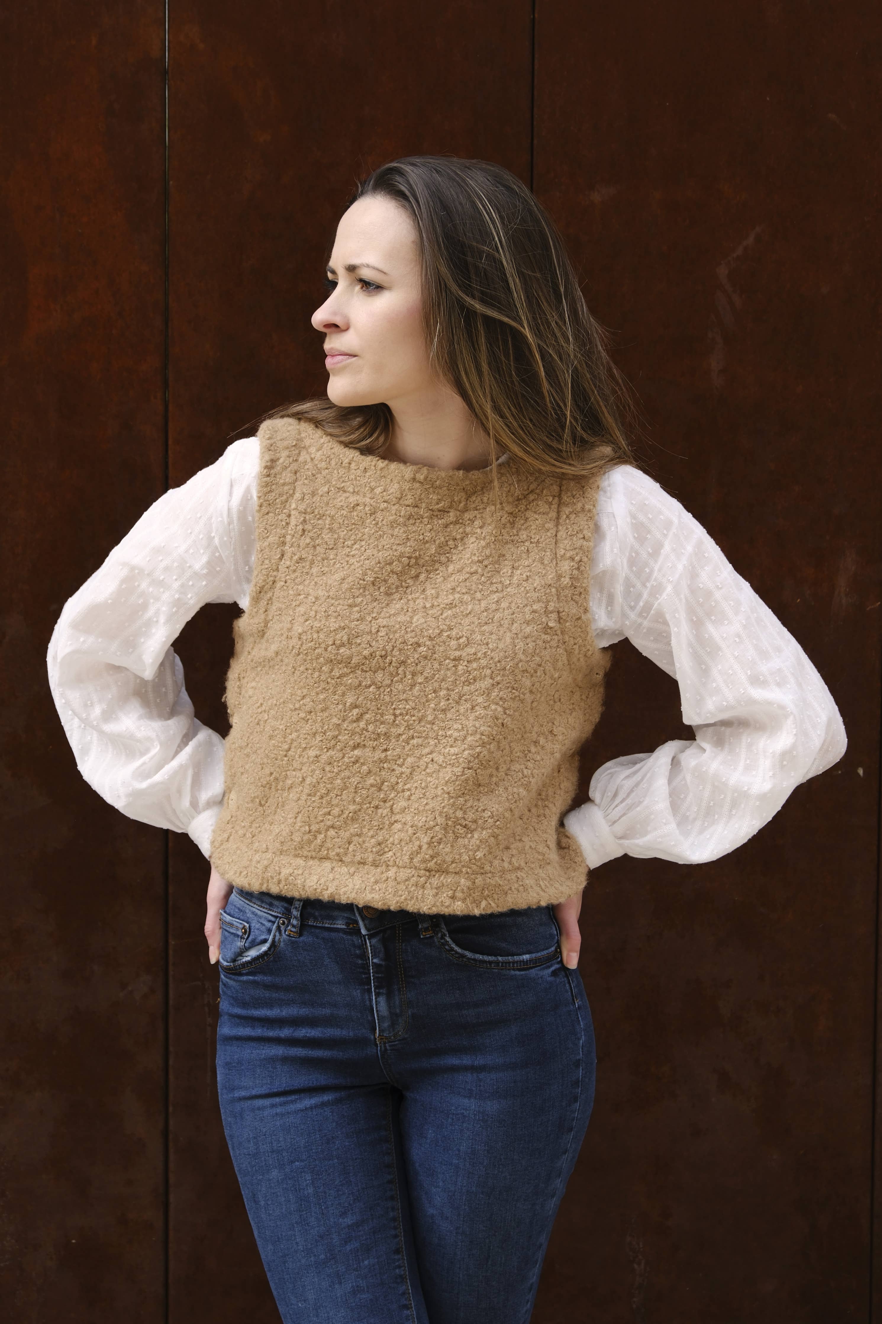 Camel bouclé Téva Slipover worn over a white blouse with jeans, front view