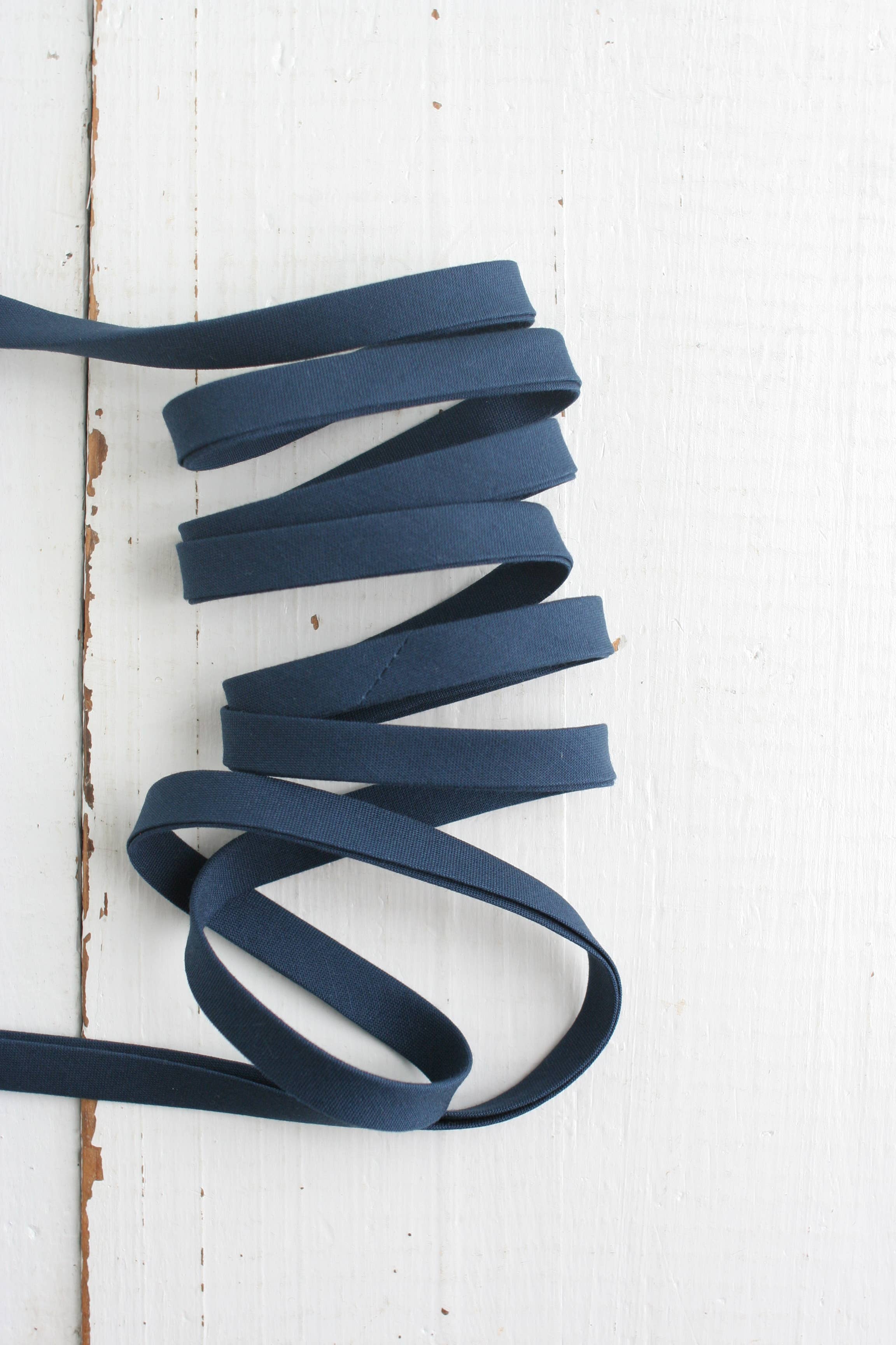 Navy Pure Solid 1/2 inch double fold cotton bias binding tape by Bessie Pearl Binding Co