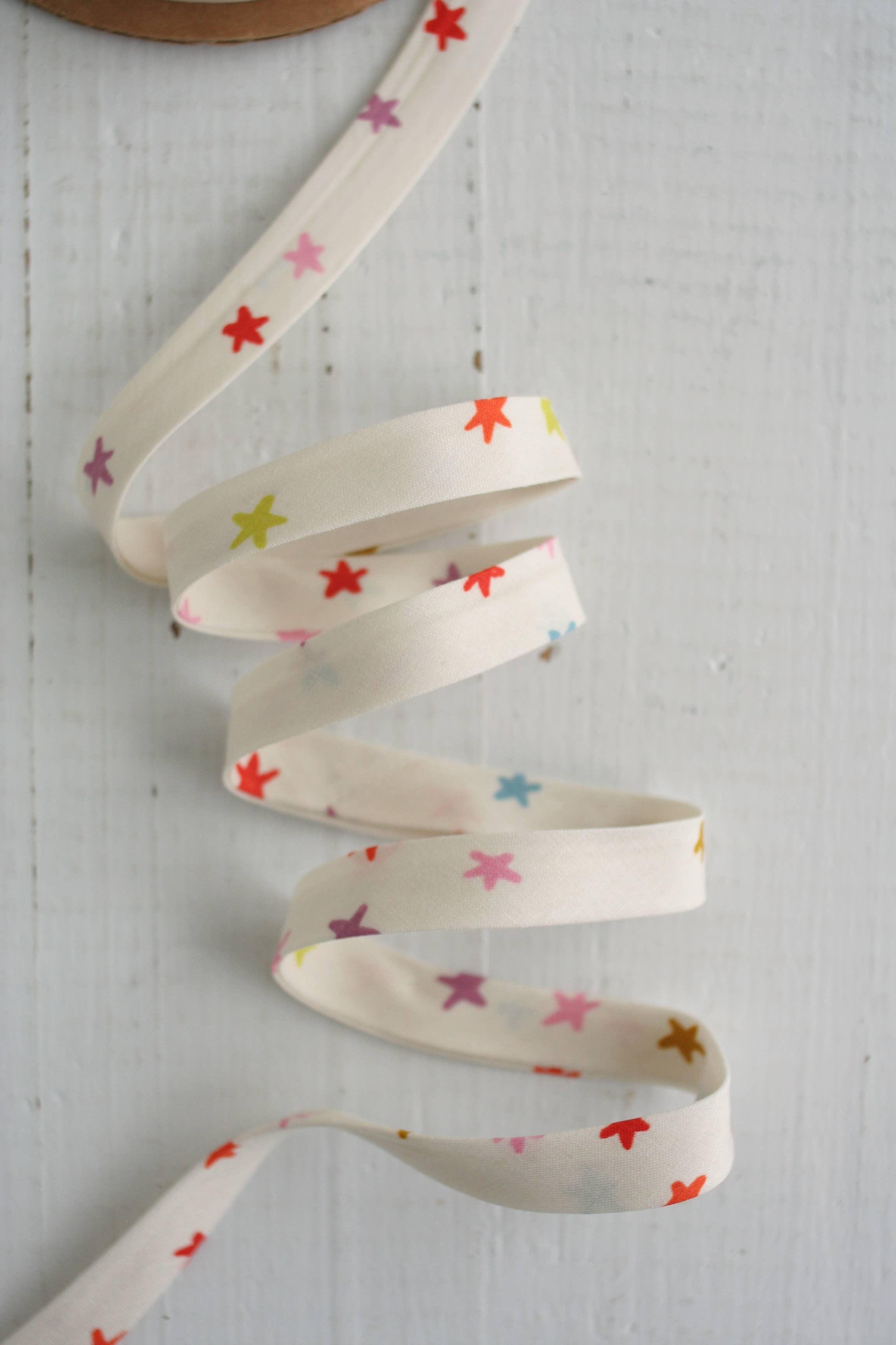 Starry Multi 1/2 inch double fold cotton bias binding tape by Bessie Pearl Binding Co
