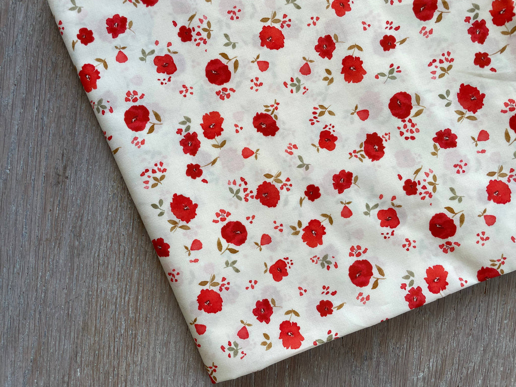 Atelier 27 Poppy print cotton poplin draped showing lightweight hand and print scale