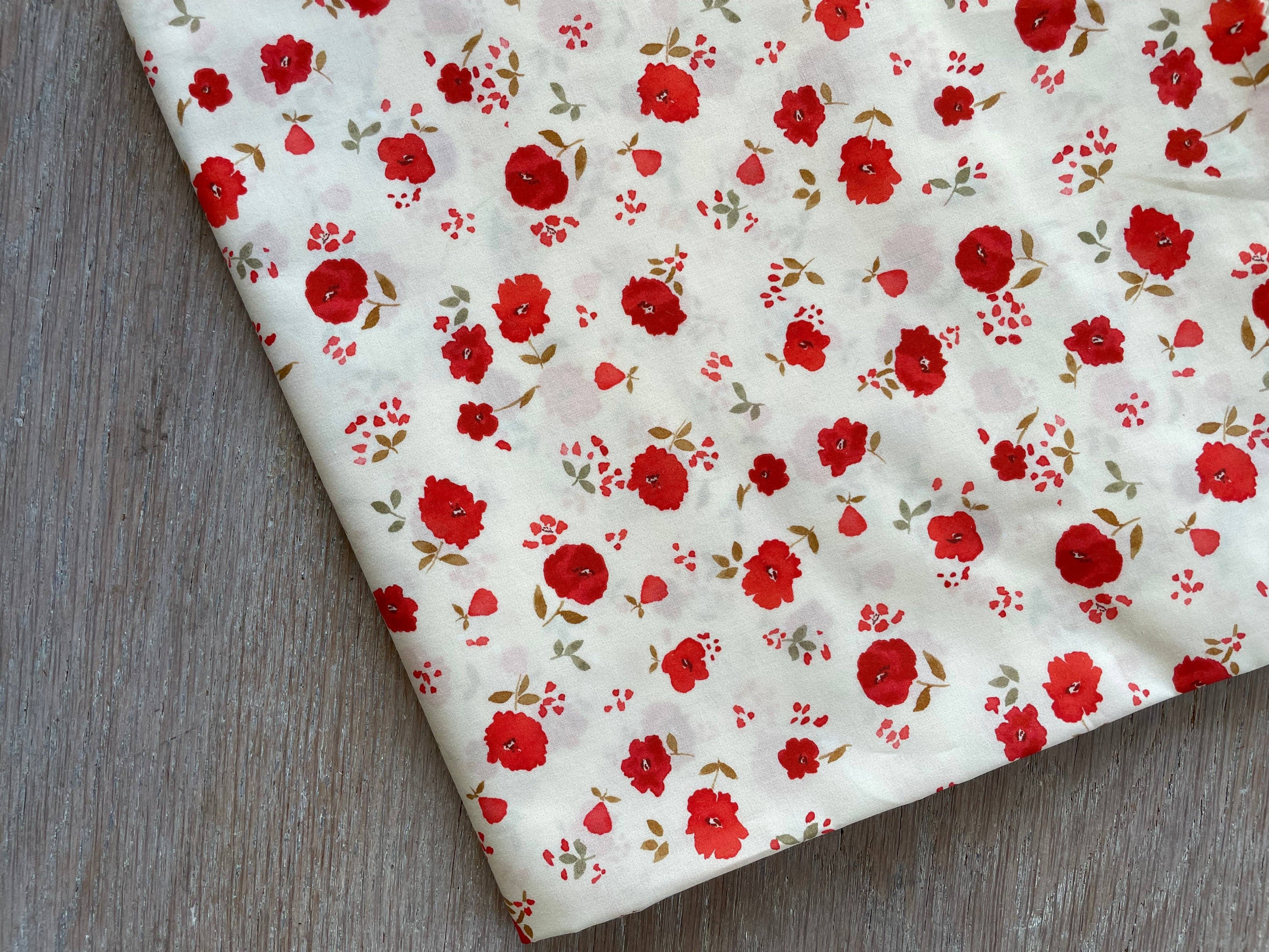 Atelier 27 Poppy print cotton poplin draped showing lightweight hand and print scale