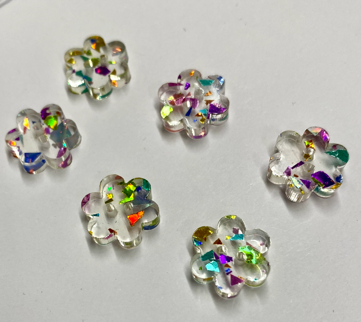 Infamous Cuts - 1/2" Confetti Glitter Two Hole Flower Acrylic Button