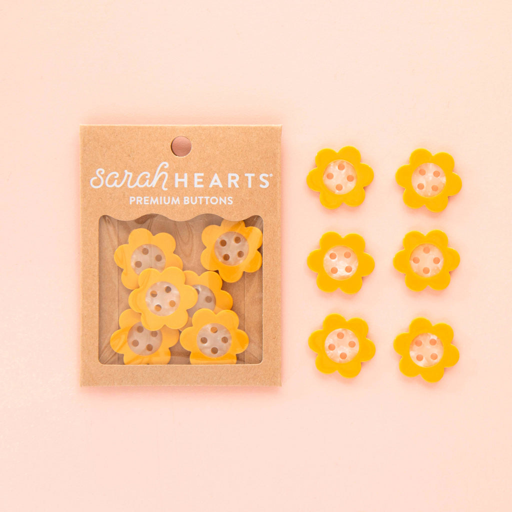 Yellow daisy-shaped buttons, pack of 6, 1 inch, plant-based cellulose acetate, on Sarah Hearts branded card