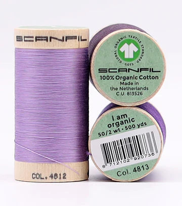 Cool Purples organic cotton thread on natural wood spools, detail