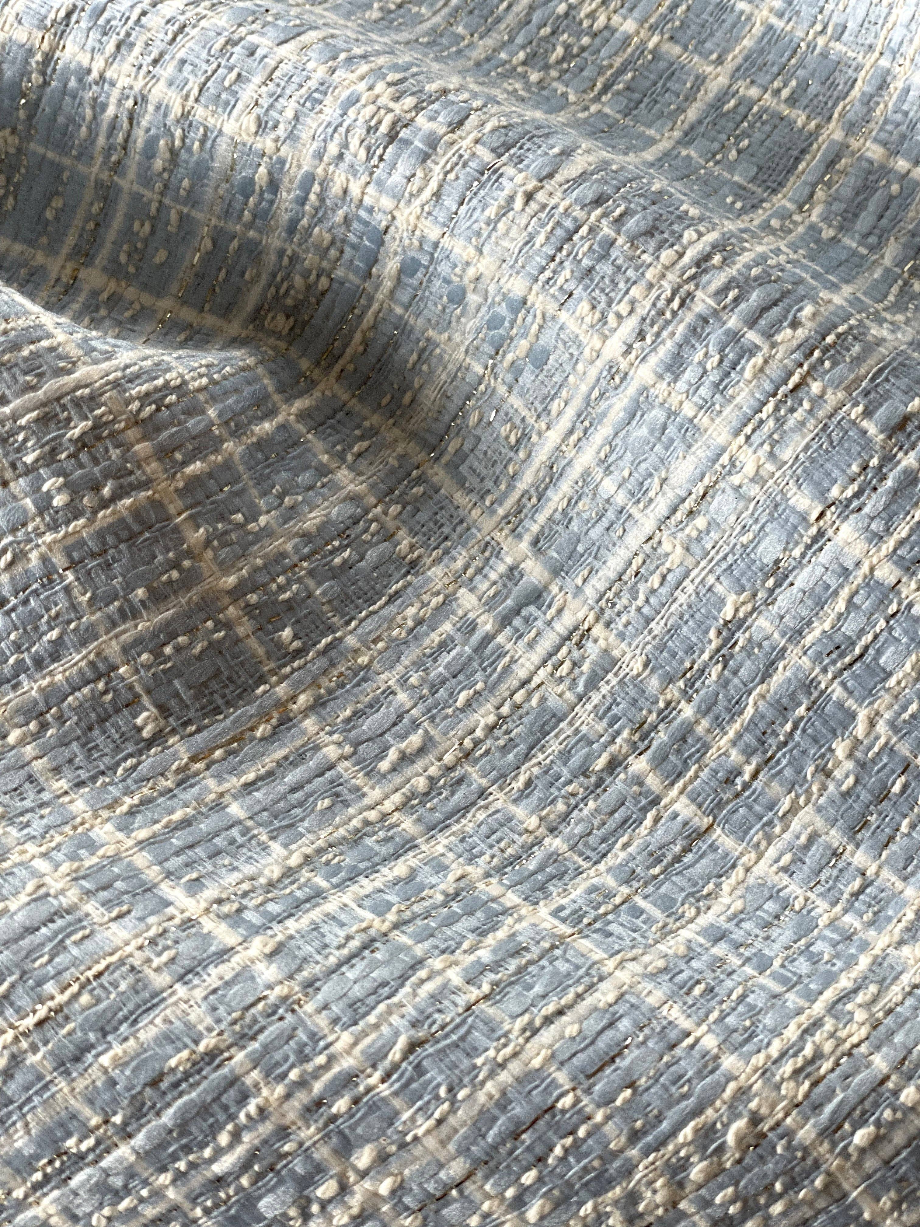 Close-up of Augustin jacquard fabric by Atelier 27 showing woven metallic thread detail