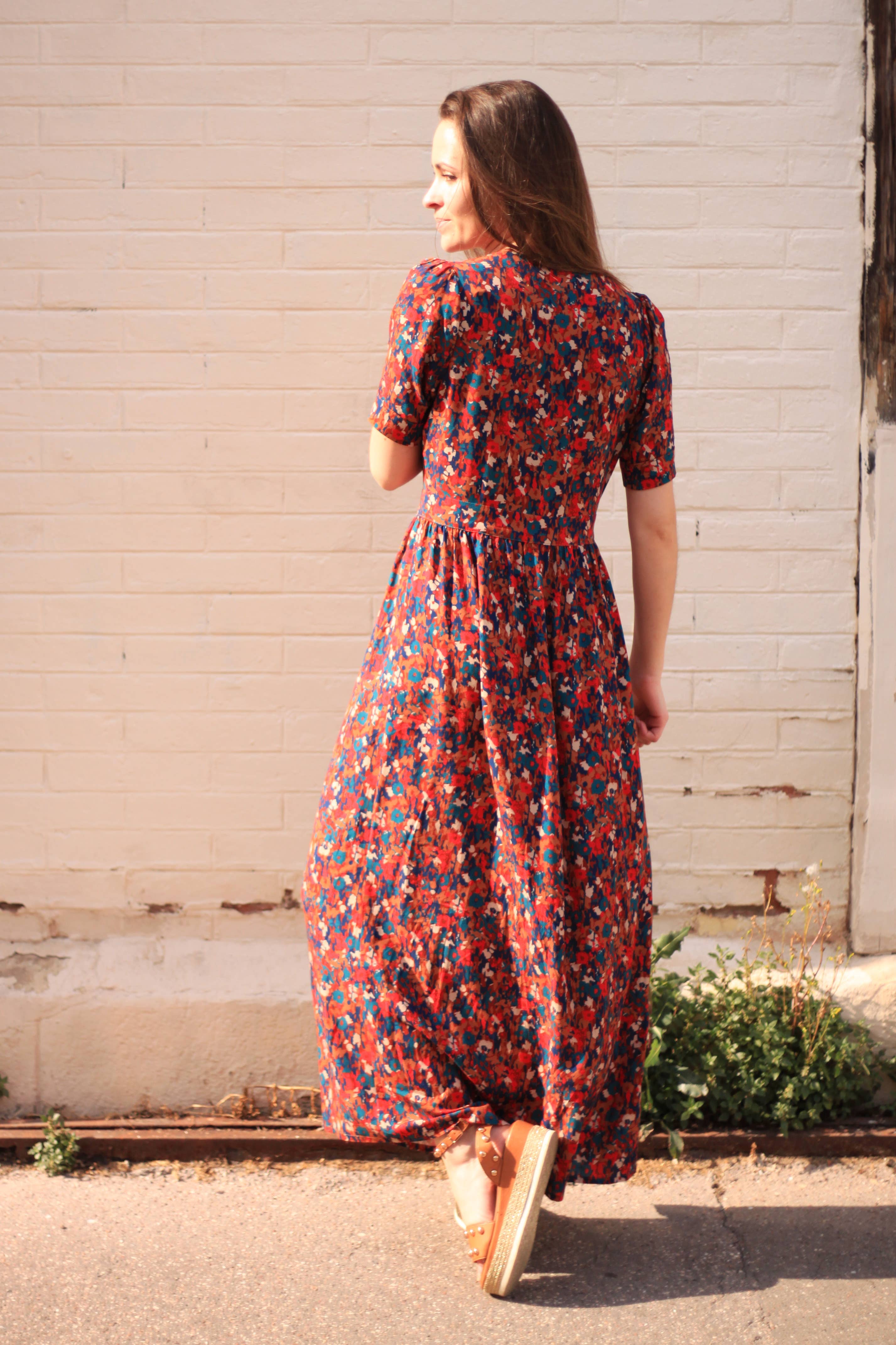 Back view of the dark floral maxi Garance Dress