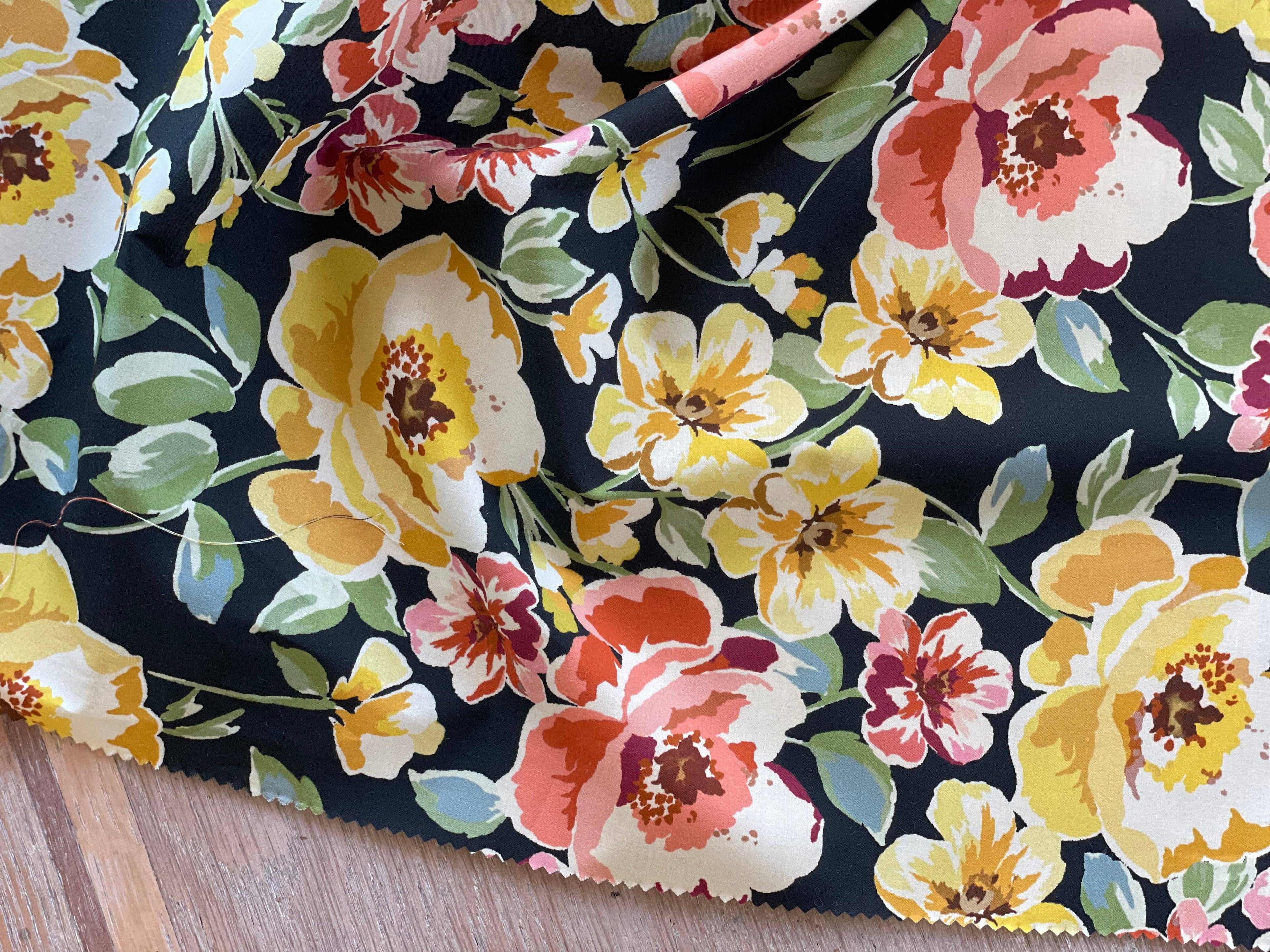 Close-up of Pia print poplin fabric by Atelier 27 showing bold maxi floral detail