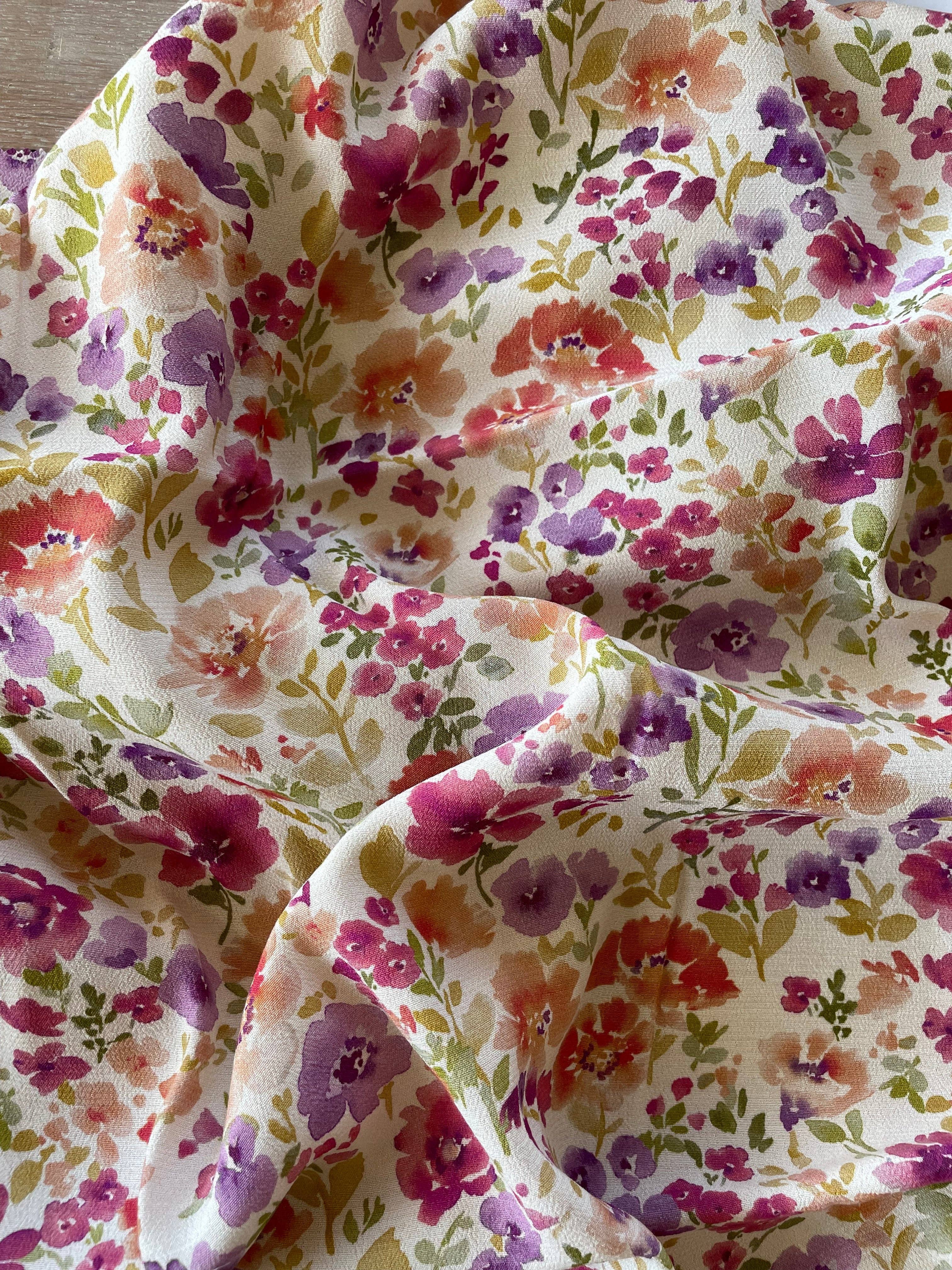 Close-up of Felicità print viscose crepe by Atelier 27 showing watercolour floral detail
