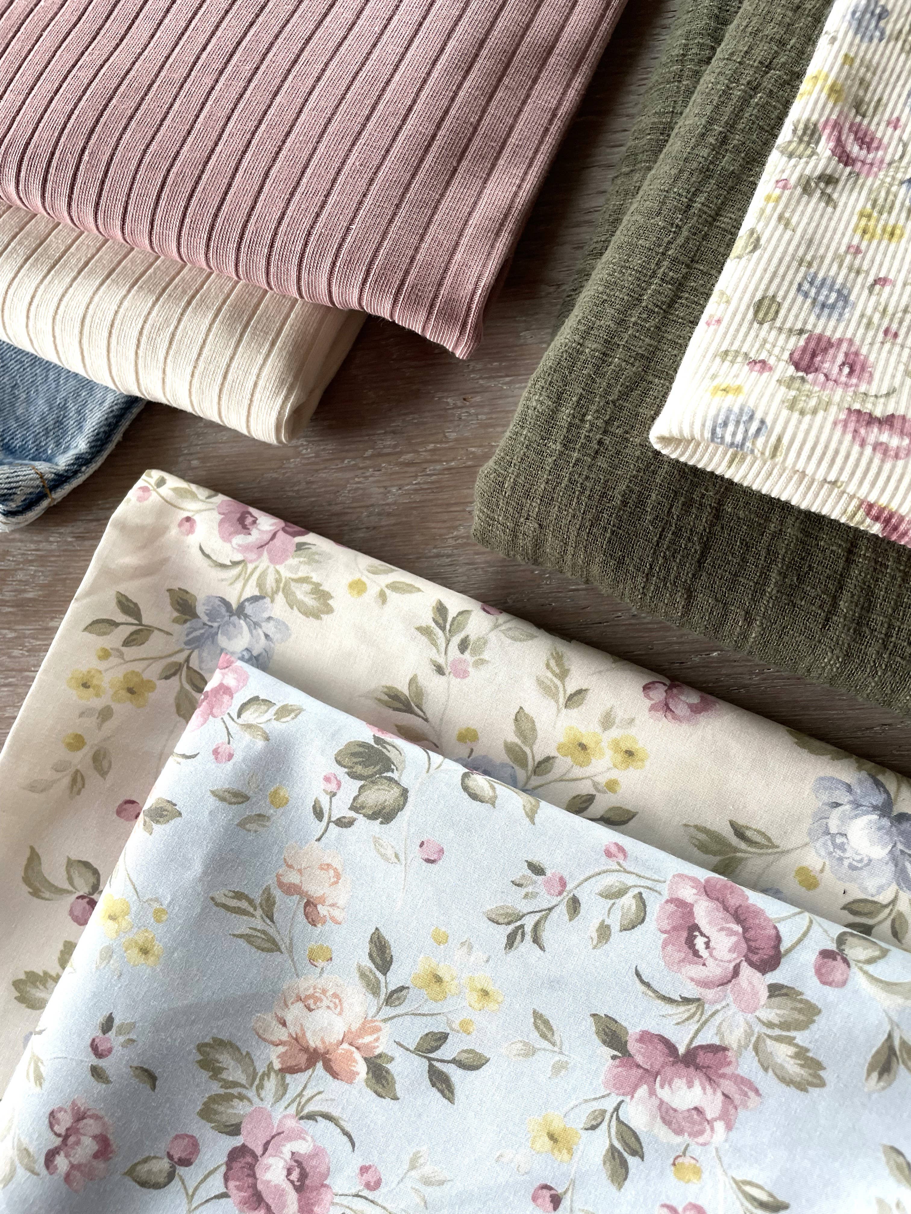 Close-up of Louison mini-rib jersey by Atelier 27 showing floral stripe and rib texture
