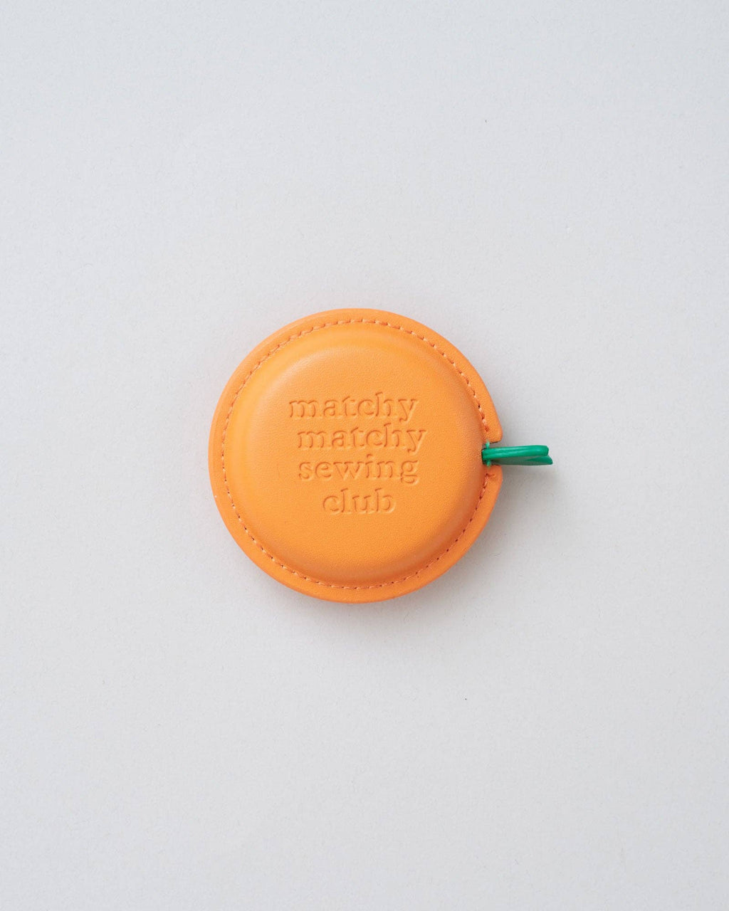 Clementine measuring tape with embossed Matchy Matchy Sewing Club logo