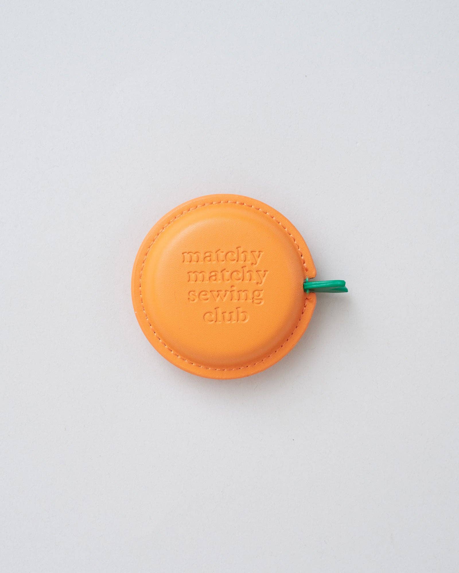 Clementine measuring tape with embossed Matchy Matchy Sewing Club logo