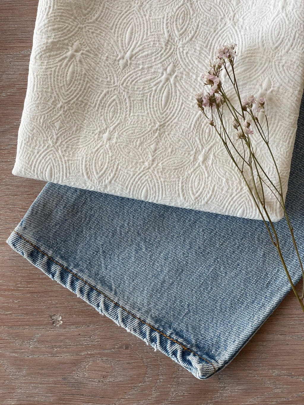 Atelier 27 Poem jacquard fabric draped showing structured body and ivory colorway