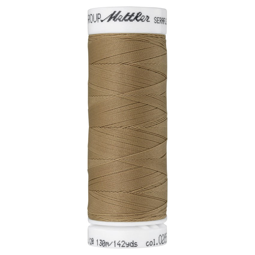 Mettler SERAFLEX stretch thread spool in Caramel Cream 0285, 142 yards