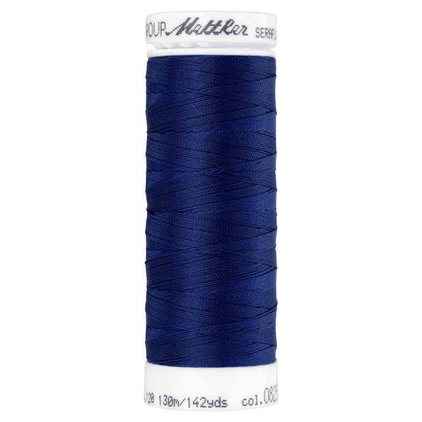 Mettler SERAFLEX stretch thread spool in Navy 0825, 142 yards
