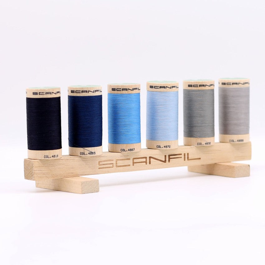 Frosty Winter 6-spool organic thread set on wooden display stand, view 4