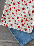 Atelier 27 Poppy print fine cotton poplin fabric, poppy flowers on warm vanilla background