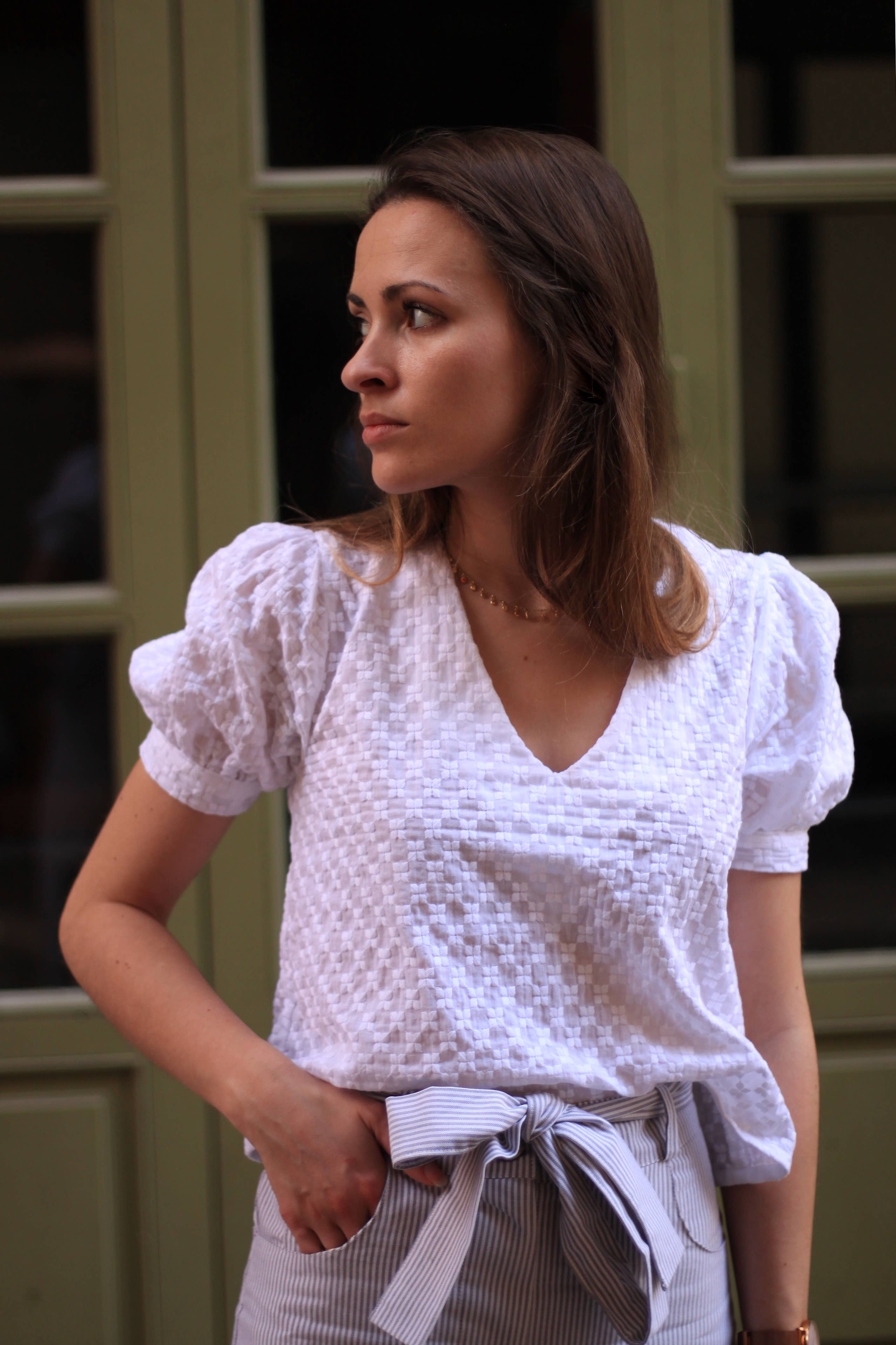 Eléanor Top sewing pattern by Cha' coud sewn in white textured cotton with puff sleeves, front view