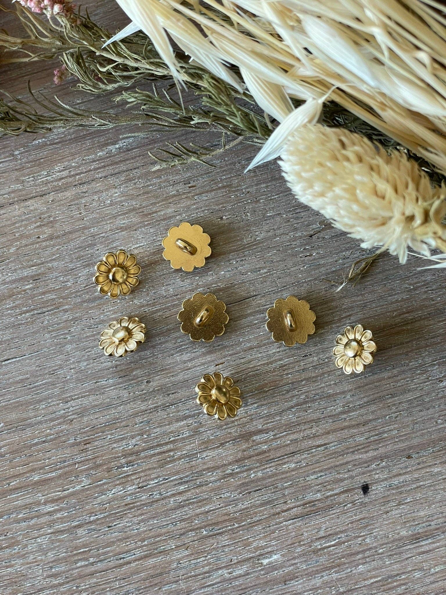 La Chicorée Atelier 27 gold buttons styled on garment fabric