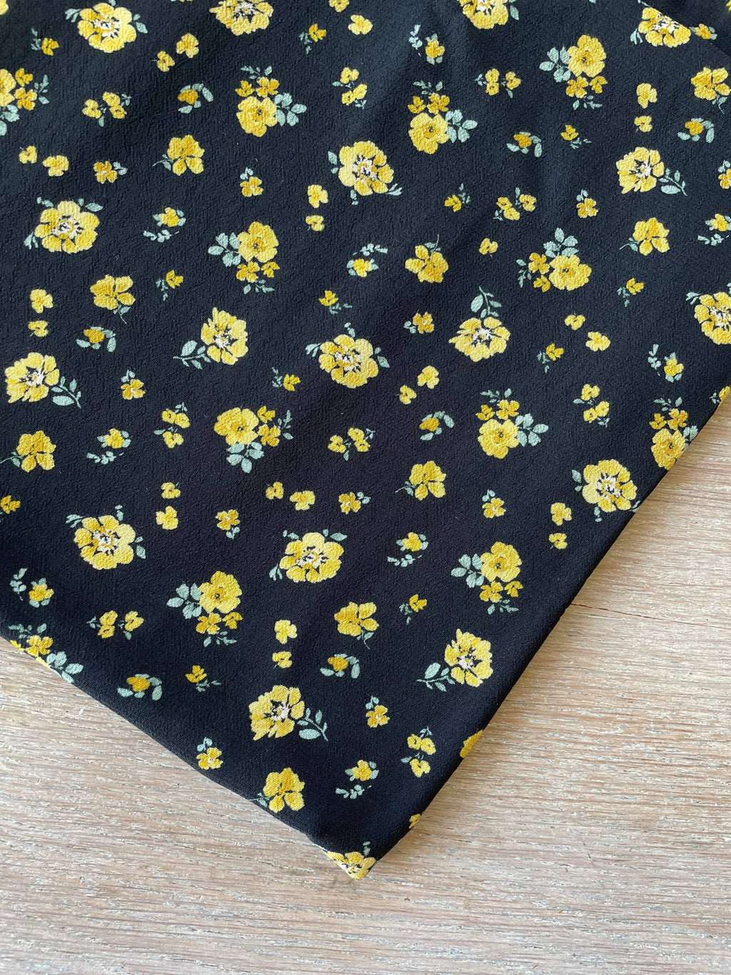 Atelier 27 Lili print ECOVERO viscose Moroccan crepe fabric, ochre and lemon floral on black